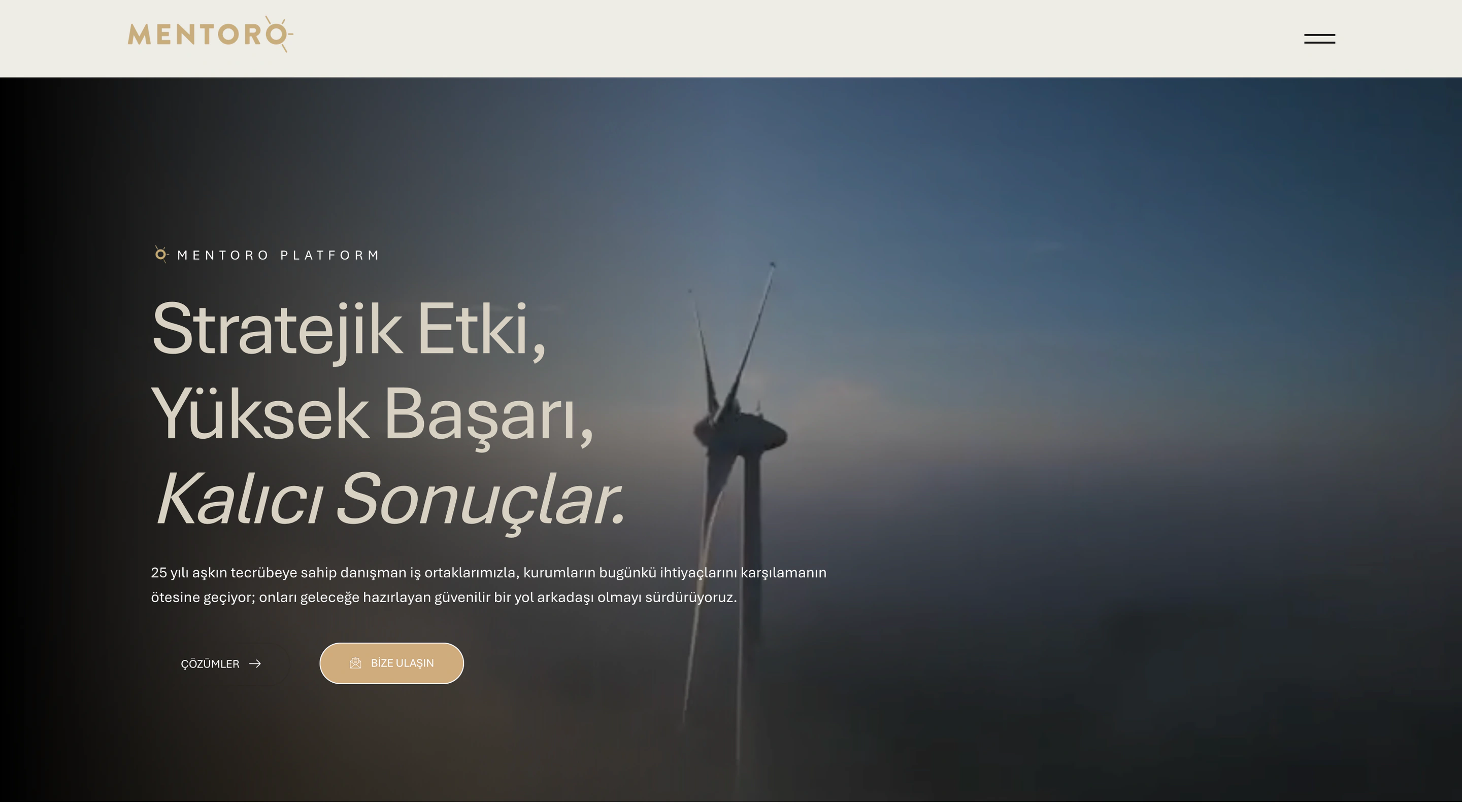 Mentoro homepage with a gold logo, Turkish strategy headline and contact button over a wind-turbine background